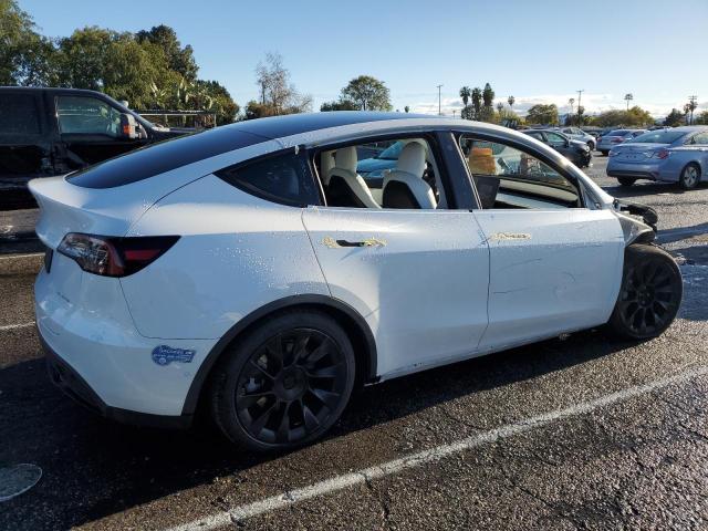 Photo 3 from auction – 2021 TESLA MODEL Y with VIN 5YJYGDEE9MF152263