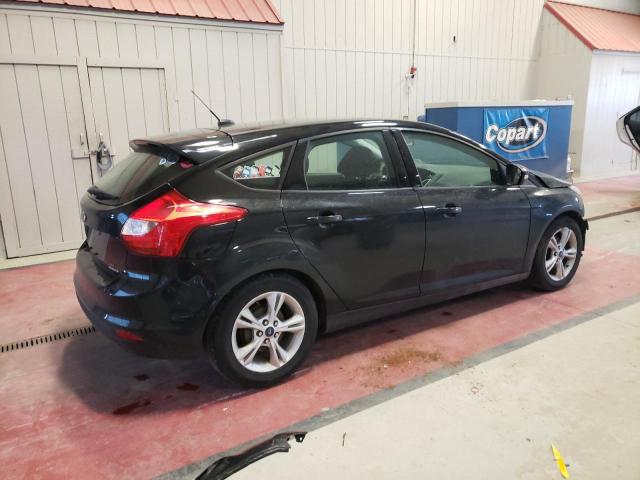 Foto 3 de la subasta – 2014 FORD FOCUS SE con VIN 1FADP3K2XEL404948