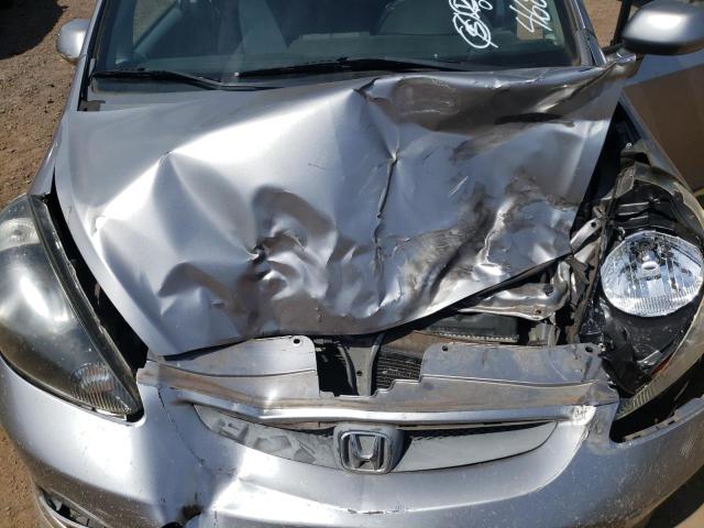 Photo 11 from auction – 2007 HONDA FIT S with VIN JHMGD38697S002372