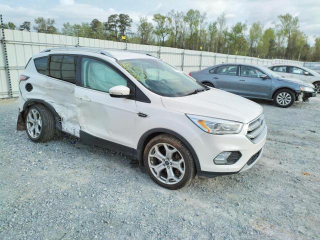 Photo 4 from auction – 2017 FORD ESCAPE TIT with VIN 1FMCU9J98HUA35954