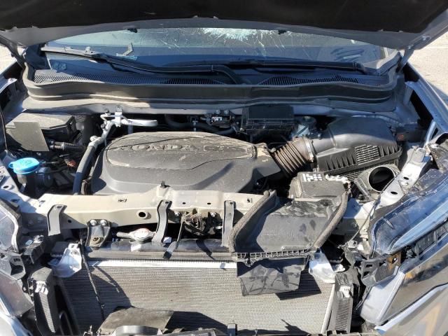 Photo 11 from auction – 2022 HONDA PILOT SE with VIN 5FNYF6H23NB013215