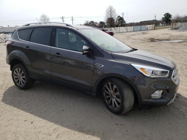 Photo 4 from auction – 2018 FORD ESCAPE TIT with VIN 1FMCU0J97JUC20921