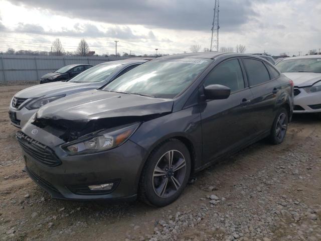 FORD FOCUS SE 2018 with VIN 1FADP3F29JL269109 - Photo from auction
