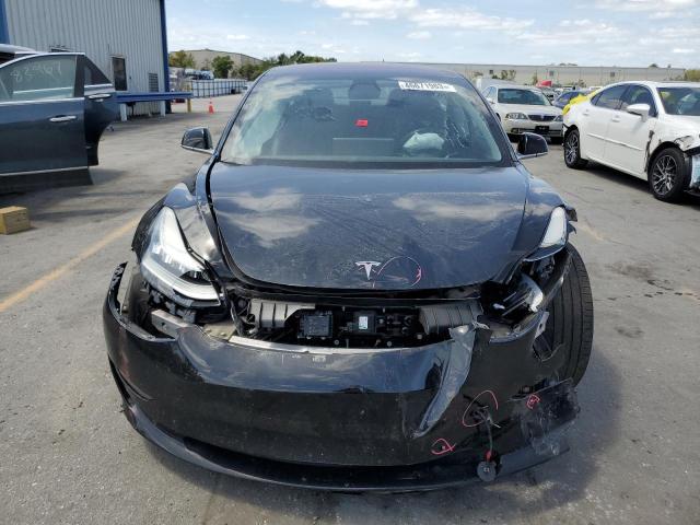 Photo 5 from auction – 2018 TESLA MODEL 3 with VIN 5YJ3E1EAXJF036125
