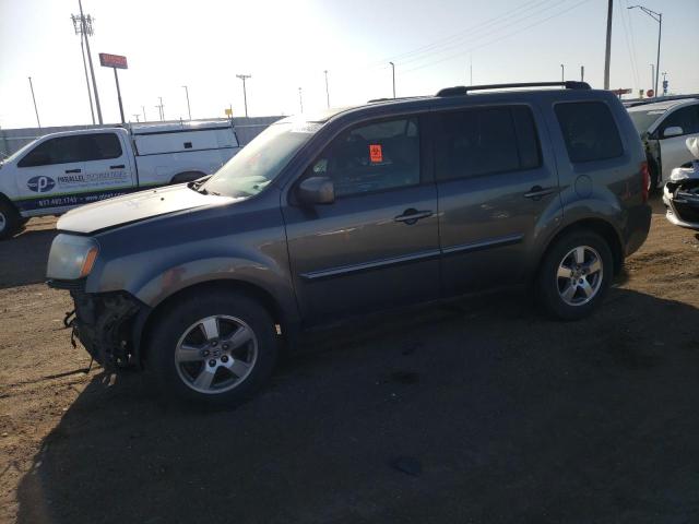 HONDA PILOT EXL 2011 with VIN 5FNYF4H50BB015093 - Photo from auction
