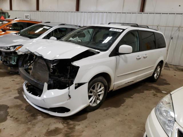 DODGE GRAND CARA 2015 with VIN 2C4RDGCG7FR535614 - Photo from auction