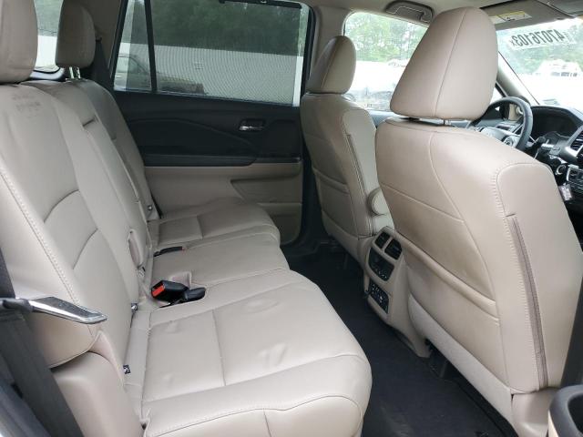 Фото 11 с аукциона – 2018 HONDA PILOT TOUR с VIN 5FNYF5H97JB019388
