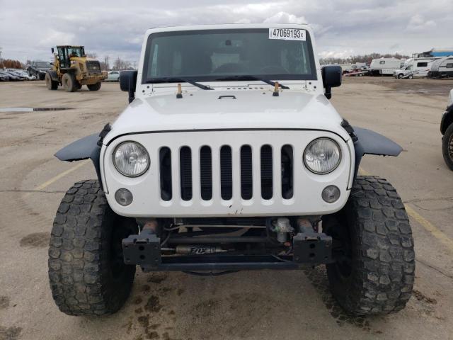 Photo 5 from auction – 2015 JEEP WRANGLER U with VIN 1C4BJWDG3FL508535