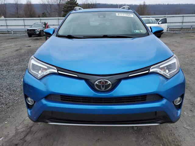 Photo 5 from auction – 2018 TOYOTA RAV4 with VIN JTMYFREV3JD111324