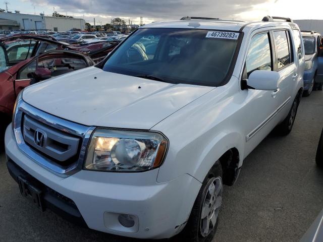 HONDA PILOT TOUR 2011 with VIN 5FNYF4H90BB005229 - Photo from auction
