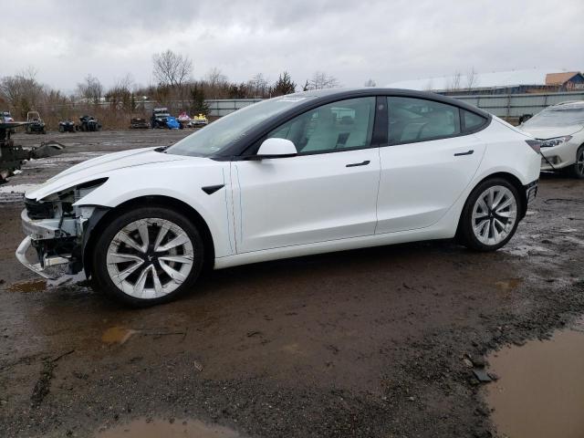TESLA MODEL 3 2021 with VIN 5YJ3E1EB9MF049056 - Photo from auction