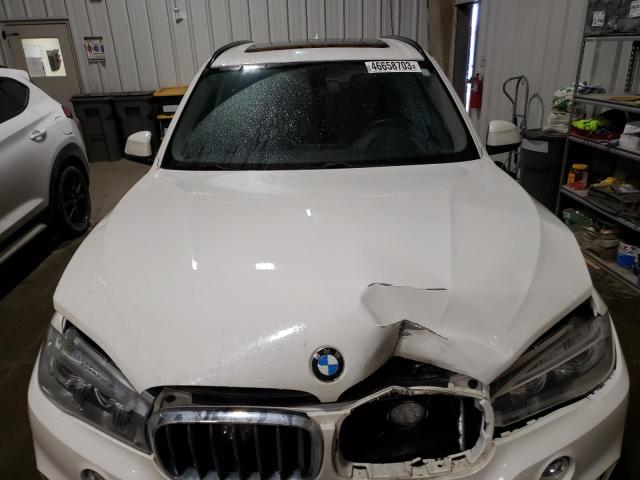 Photo 11 from auction – 2015 BMW X5 with VIN 5UXKR0C55F0P04496