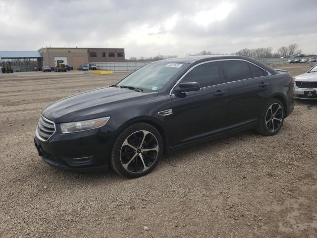 FORD TAURUS SEL 2014 with VIN 1FAHP2E81EG129300 - Photo from auction