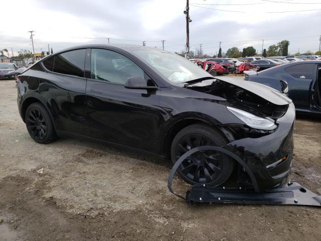 Photo 4 from auction – 2023 TESLA MODEL Y with VIN 7SAYGDEE9PA051647