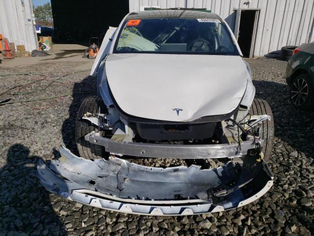 Photo 5 from auction – 2021 TESLA MODEL Y with VIN 5YJYGDEE1MF078644