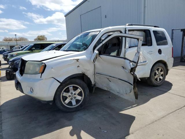 HONDA PILOT TOUR 2011 with VIN 5FNYF4H90BB046699 - Photo from auction