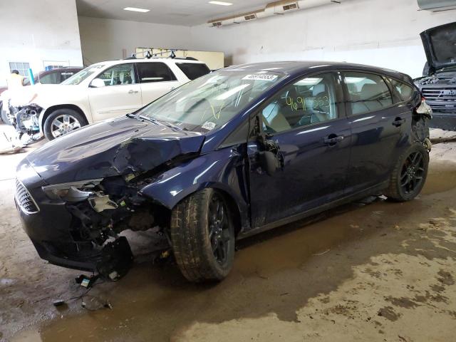FORD FOCUS SE 2016 with VIN 1FADP3K23GL312017 - Photo from auction