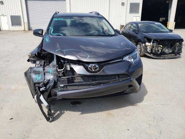 Photo 5 from auction – 2018 TOYOTA RAV4 LE with VIN JTMZFREV7JJ743569