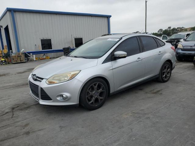 FORD FOCUS SE 2013 with VIN 1FADP3F23DL211811 - Photo from auction