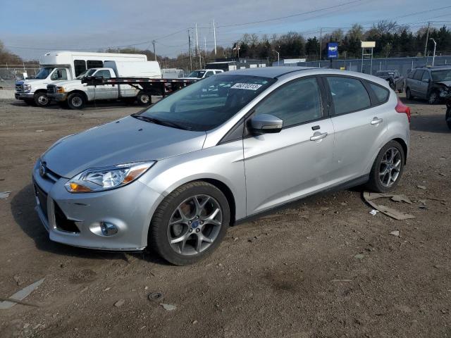 FORD FOCUS SE 2014 with VIN 1FADP3K23EL142285 - Photo from auction