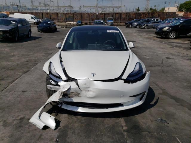 Photo 5 from auction – 2021 TESLA MODEL 3 with VIN 5YJ3E1EA6MF856738