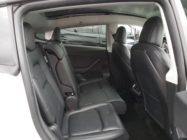 Photo 10 from auction – 2021 TESLA MODEL Y with VIN 5YJYGAEE0MF250953