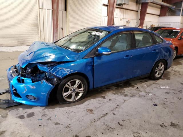 FORD FOCUS SE 2014 with VIN 1FADP3F20EL217129 - Photo from auction