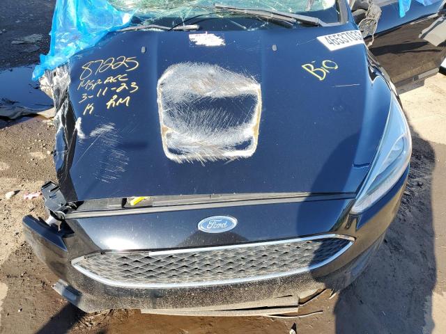 Photo 11 from auction – 2016 FORD FOCUS SE with VIN 1FADP3F22GL248319