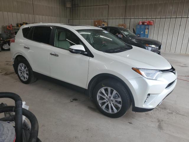 Photo 4 from auction – 2016 TOYOTA RAV4 LIMIT with VIN JTMDFREV2GJ059161