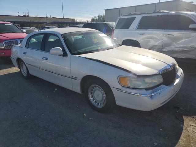 Photo 4 from auction – 2000 LINCOLN TOWN CAR E with VIN 1LNHM81W1YY908572
