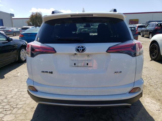 Photo 6 from auction – 2017 TOYOTA RAV4 XLE with VIN JTMWFREV3HJ114386