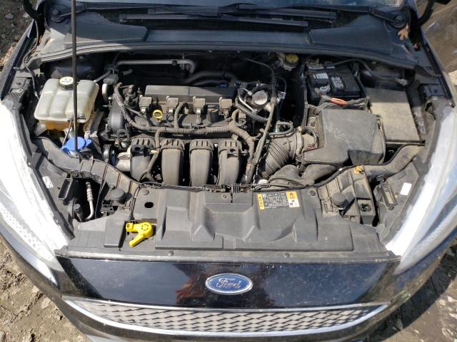Photo 11 from auction – 2016 FORD FOCUS SE with VIN 1FADP3F29GL390005