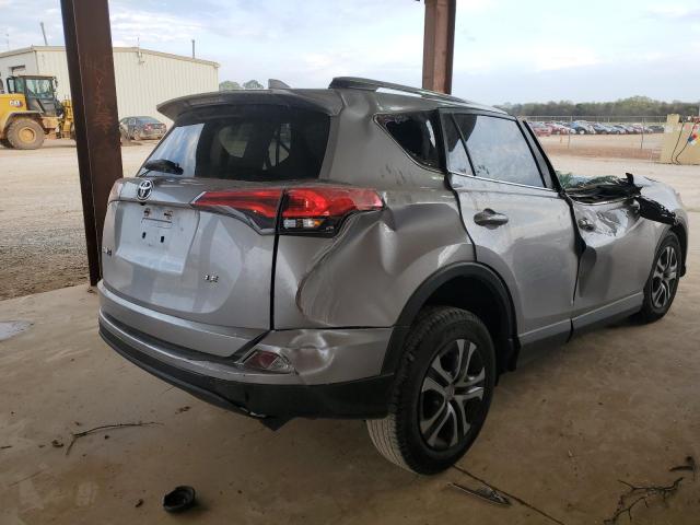 Photo 3 from auction – 2018 TOYOTA RAV4 LE with VIN JTMZFREV2JD111092