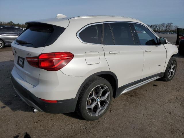 Photo 3 from auction – 2018 BMW X1 XDRIVE2 with VIN WBXHT3C38J5K27008