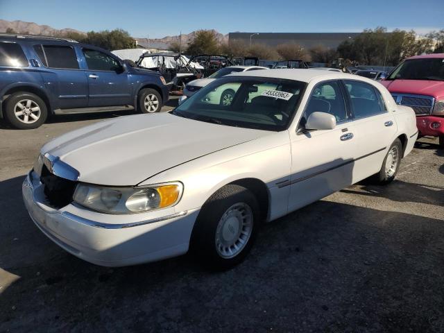 LINCOLN TOWN CAR E 2000 with VIN 1LNHM81W1YY908572 - Photo from auction