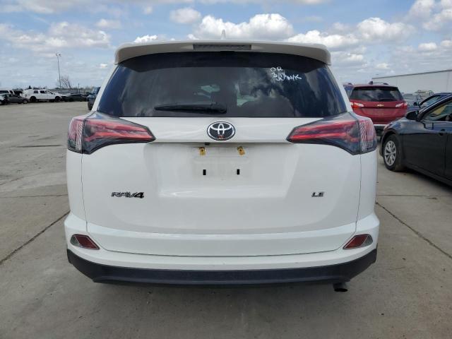 Photo 6 from auction – 2018 TOYOTA RAV4 LE with VIN JTMZFREV5JJ171840