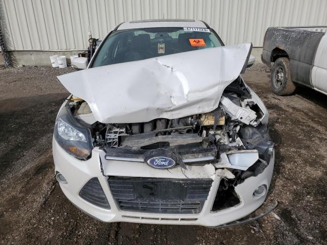 Photo 5 from auction – 2013 FORD FOCUS TITA with VIN 1FADP3J29DL328042