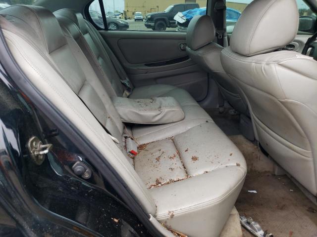 Photo 10 from auction – 2003 NISSAN MAXIMA GLE with VIN JN1DA31A93T408137