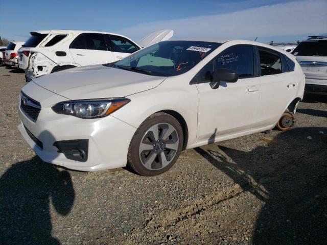 SUBARU IMPREZA 2019 with VIN 4S3GTAA66K3763396 - Photo from auction