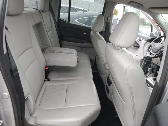 Photo 10 from auction – 2017 HONDA RIDGELINE with VIN 5FPYK2F54HB008859