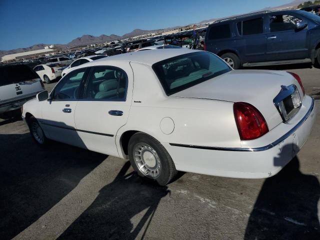 Photo 2 from auction – 2000 LINCOLN TOWN CAR E with VIN 1LNHM81W1YY908572