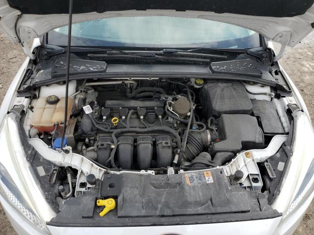 Photo 11 from auction – 2015 FORD FOCUS SE with VIN 1FADP3F24FL333824