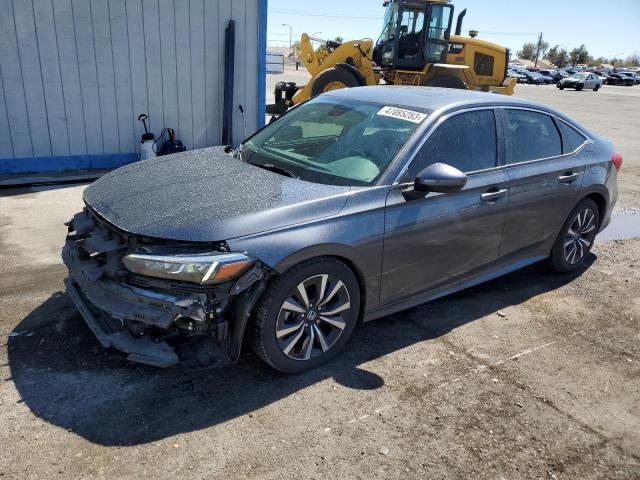 HONDA CIVIC EX 2022 with VIN JHMFE1F71NX010197 - Photo from auction