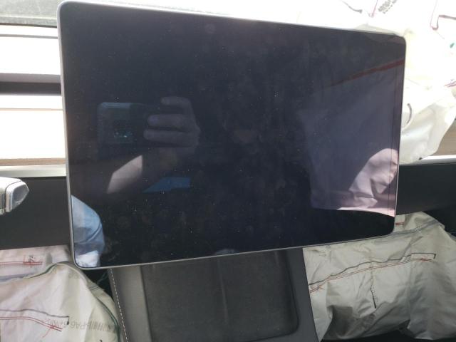 Photo 9 from auction – 2021 TESLA MODEL Y with VIN 5YJYGAEE3MF155285