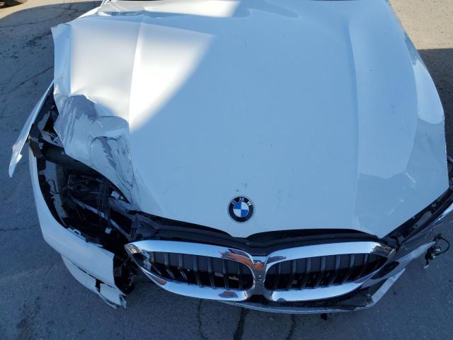Photo 11 from auction – 2020 BMW 330I with VIN 3MW5R1J09L8B23724