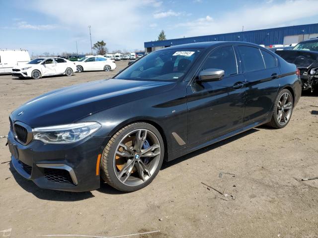 BMW M550XI 2019 with VIN WBAJB9C56KB288301 - Photo from auction