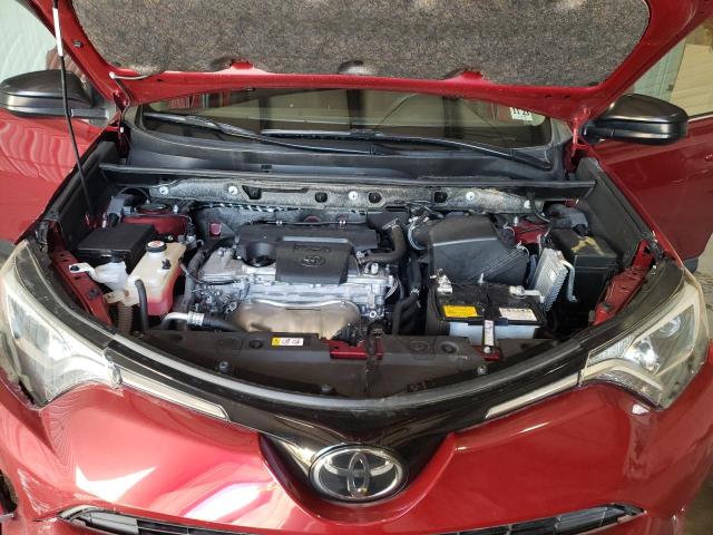 Photo 12 from auction – 2018 TOYOTA RAV4 LE with VIN JTMBFREV1JD250776