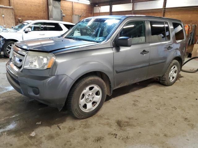 HONDA PILOT LX 2011 with VIN 5FNYF4H20BB100425 - Photo from auction
