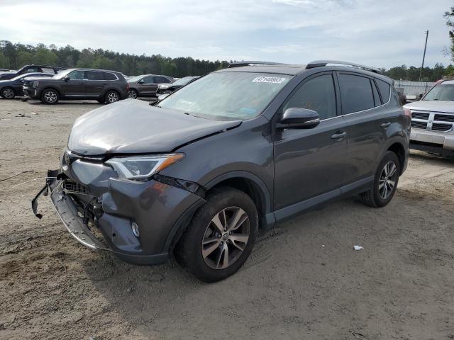 TOYOTA RAV4 LE 2018 with VIN JTMWFREV2JJ153573 - Photo from auction