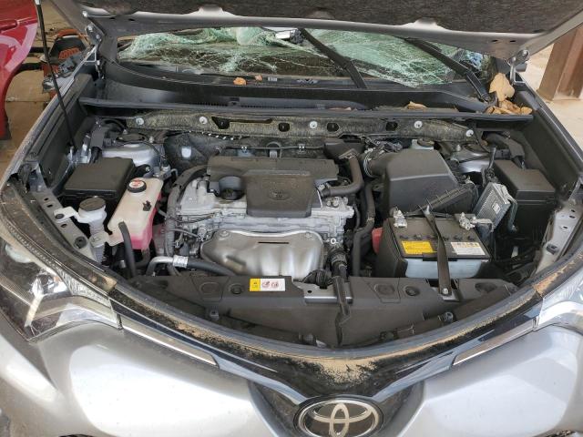 Photo 12 from auction – 2018 TOYOTA RAV4 LE with VIN JTMZFREV2JD111092